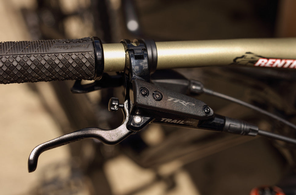 TRP Trail EVO brake system hero image showcasing trail-specific hydraulic disc brake technology and design