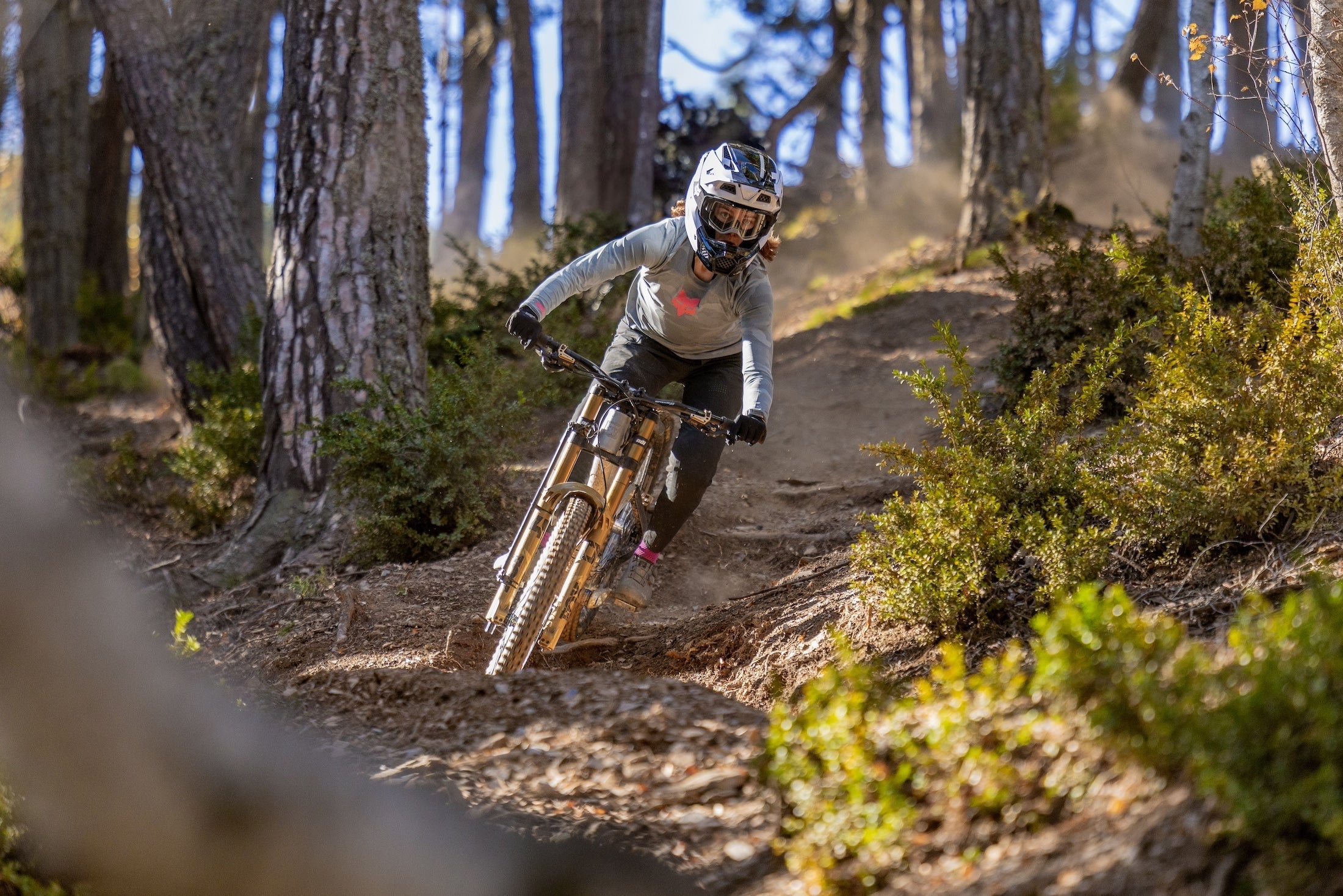 Anna Newkirk on downhill bike with TRP breaks