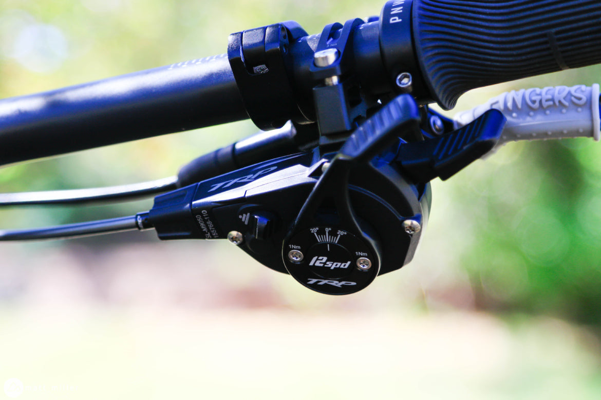 close‑up of TRP EVO 12 12‑speed drivetrain MTB shifter