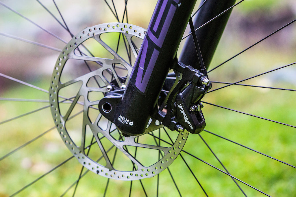 TRP Slate brake system product photography showcasing trail-specific hydraulic disc brake technology
