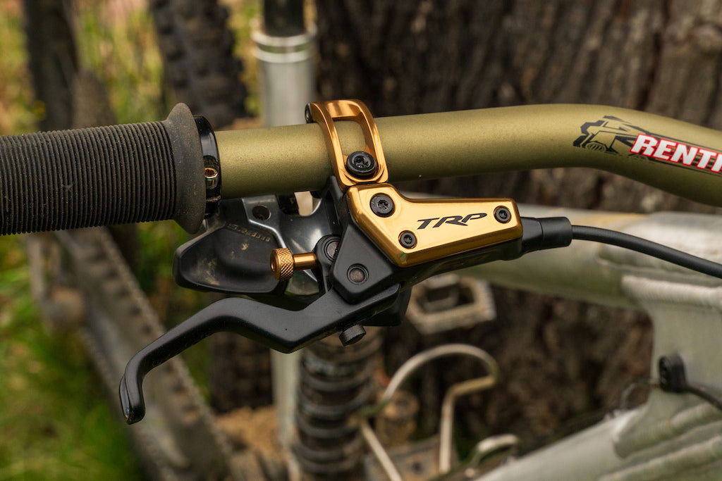 Close up of TRP EVO brake lever on a  mountain bike handlebar