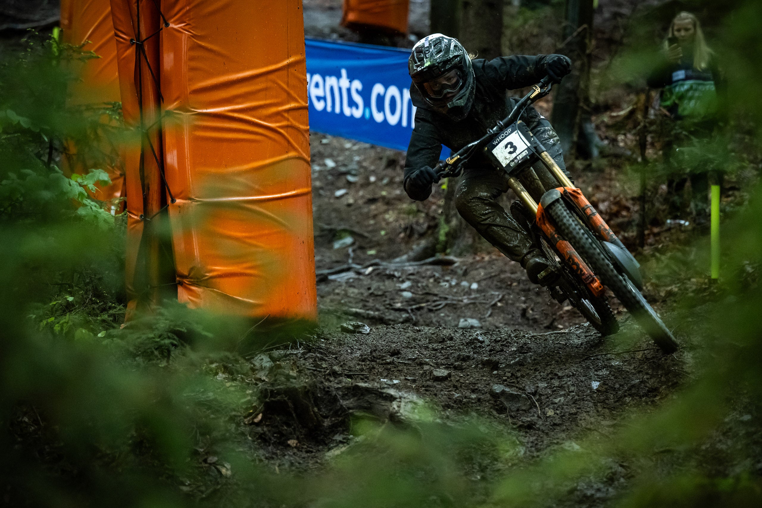 TRP Team Racer riding a mountain bike on a muddy trail