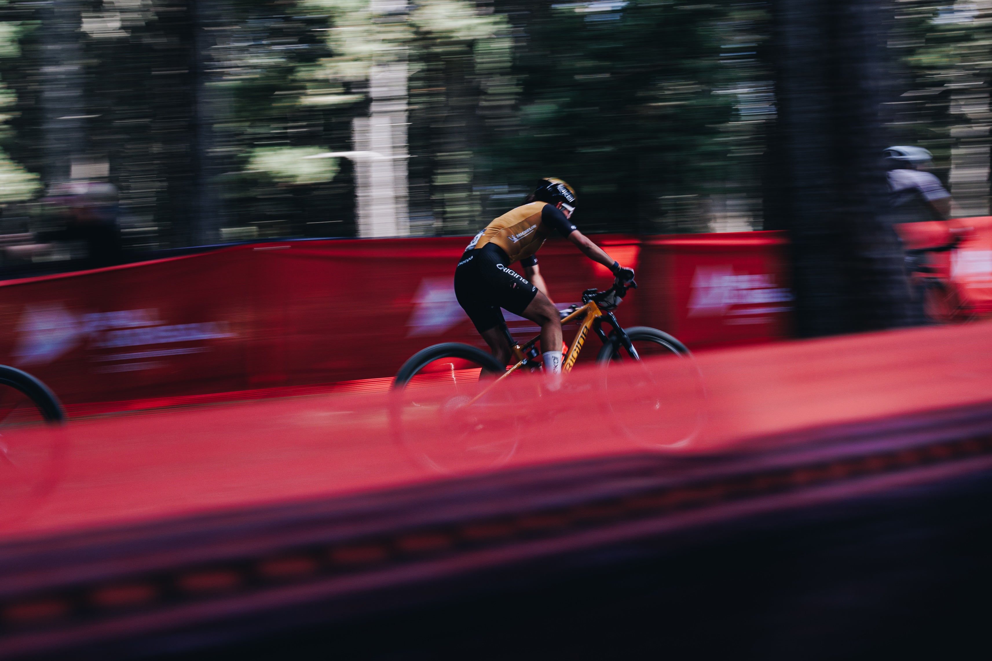 TRP Team Biker on mountain bike in blurred motion